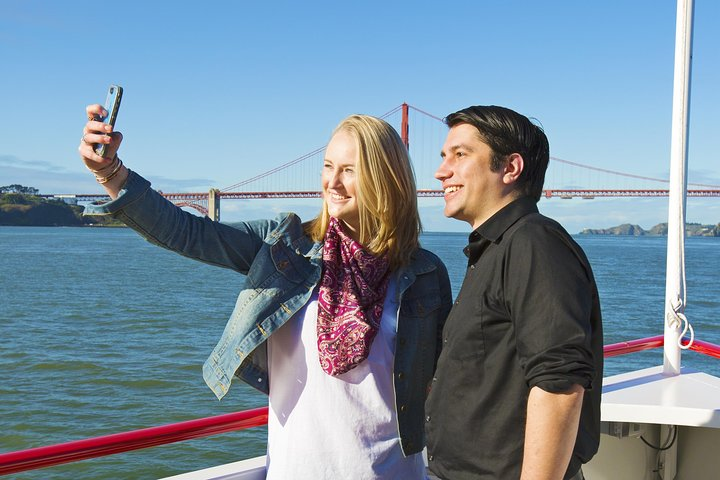 Experience the stunning San Francisco Bay with a scenic cruise that takes you under the Golden Gate Bridge and around Alcatraz. Capture unforgettable moments while enjoying local wildlife and breathtaking views.
